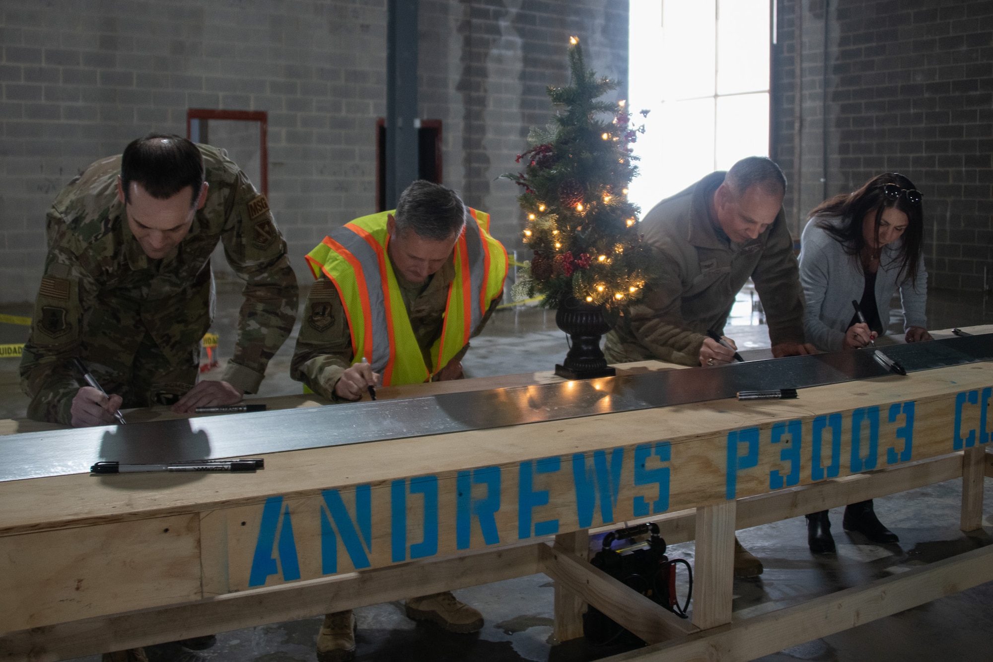 Joint Base Andrews leadership sign wooden table