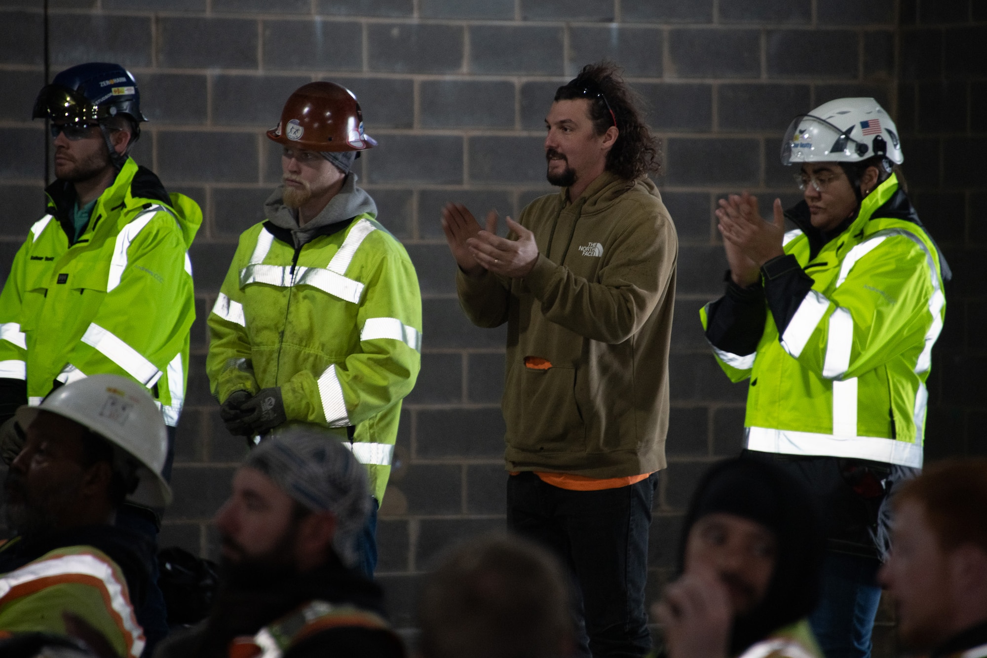 Construction workers applaud