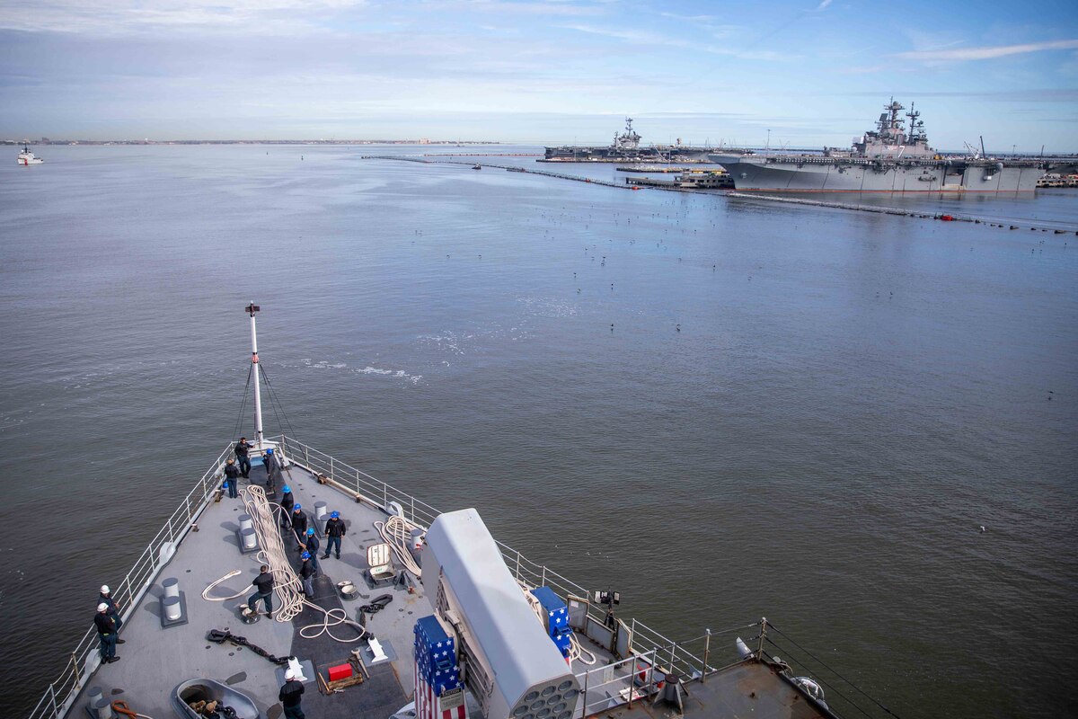 A Navy ship transits open waters.