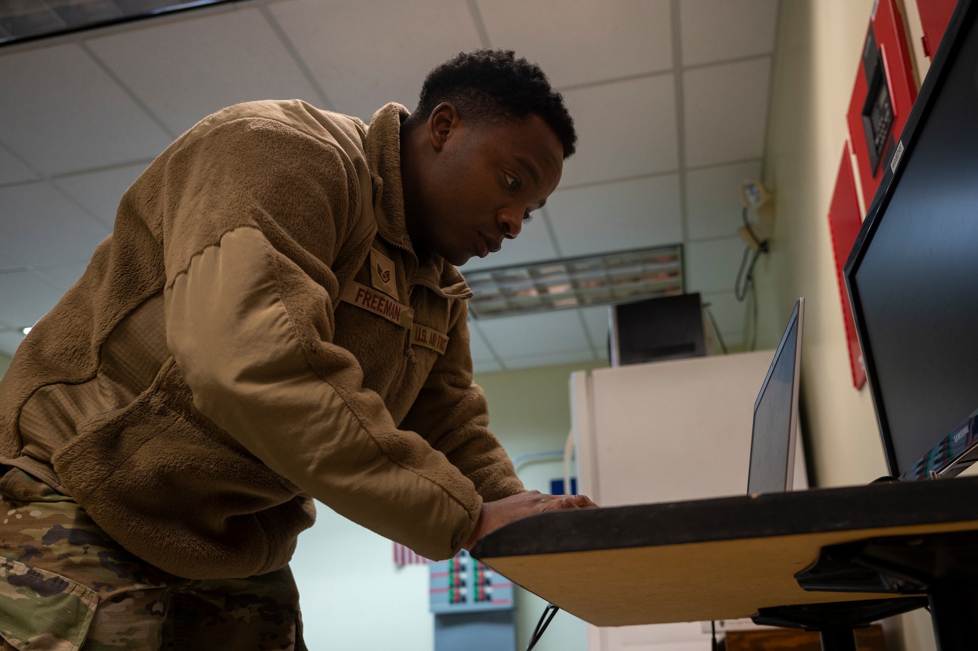 U.S. Air Force Staff Sgt. Jabari Freeman, 51st Operations Support Squadron weather technician, practices reestablishing operations in an alternate duty location after a simulated cyberattack during Beverly Midnight 24-1 at Osan Air Base, Republic of Korea, Jan. 29, 2024. The 51st OSS Airmen practiced relocating to train using available resources to maintain operational readiness. BM24-1 is a routine training event that tests the military capabilities across the peninsula, allowing combined and joint training at both the operational and tactical levels. (U.S. Air Force photo by Senior Airman Kaitlin Castillo)