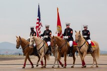 U.S. Marine Corps Mounted Color Guards participate in the opening ceremony during the 2023 Marine Corps Air Station Miramar Airshow in San Diego, Sept. 22, 2023. America's Airshow 2023 is a unique and incredible opportunity to witness Marine and joint aviation capabilities, civilian performers, and the world-famous Blue Angels; to interact first-hand with Marines, other service members, and first responders; and to see first-hand the innovative spirit of the Marine Corps through emerging technologies and forward-thinking. (U.S. Marine Corps photo by Pfc. Seferino Gamez)