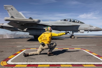 Lt. Cmdr. Sean Smith shoots an EA-18G Growler from VAQ-133 from USS Abraham Lincoln (CVN 72).