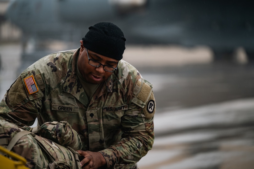 A U.S. Army Soldier loads equipment onto aircraft at Joint Base McGuire-Dix-Lakehurst, N.J., Jan. 25, 2024. More than 1,500 New Jersey Army National Guard Soldiers are deploying to support U.S. Central Command’s Combined Joint Task Force-Operation Inherent Resolve. This is the largest deployment of NJARNG Soldiers since 2008. (U.S. Air Force photo by Senior Airman Sergio Avalos)