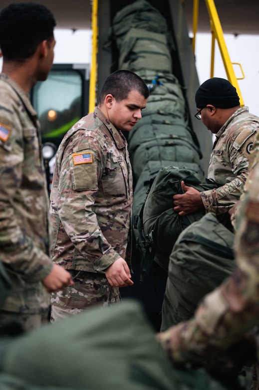 U.S. Army Soldiers assigned to the New Jersey Army National Guard load their bags at Joint Base McGuire-Dix-Lakehurst, N.J., Jan. 25, 2024. More than 1,500 NJARNG Soldiers are deploying to support U.S. Central Command’s Combined Joint Task Force-Operation Inherent Resolve. This is the largest deployment of NJARNG Soldiers since 2008. (U.S. Air Force photo by Senior Airman Sergio Avalos)