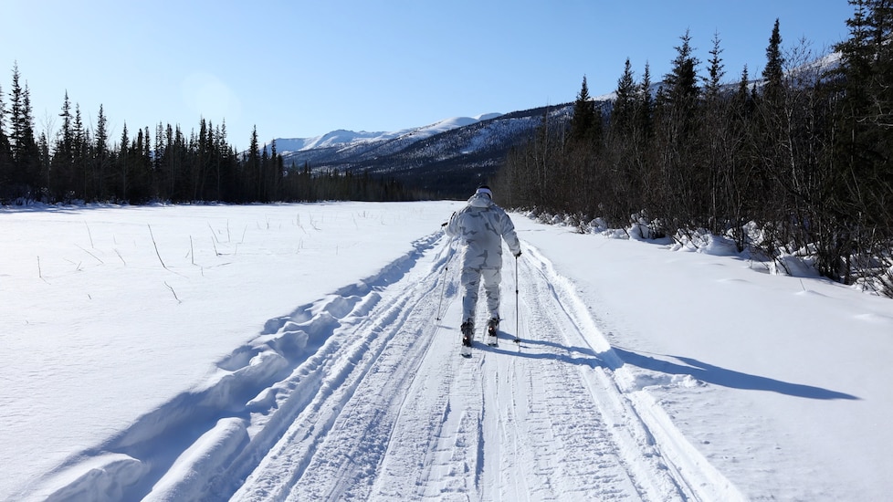 A Green Beret with 10th Special Forces Group (Airborne) skis to a helicopter landing zone during Exercise ARCTIC EDGE 2022 in Wiseman, Alaska, March 14, 2022. AE22 is a biennial, multi-service exercise designed to provide realistic and effective training for participants using the premier training locations available throughout Alaska February 28 – March 17. (U.S. Army photo by Staff Sgt. Anthony Bryant)