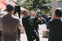 NBSW 32nd Street Brass Band performs for the public at Point Loma’s Liberty Station to celebrate the site, which previously served as Navy Training Command, turning 100 this year.