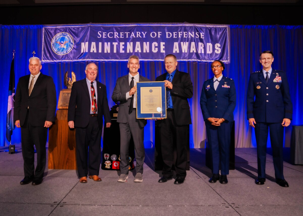 76th Software Engineering Group accept the Rear Admiral Grace M. Hopper Award for Software Maintenance Excellence