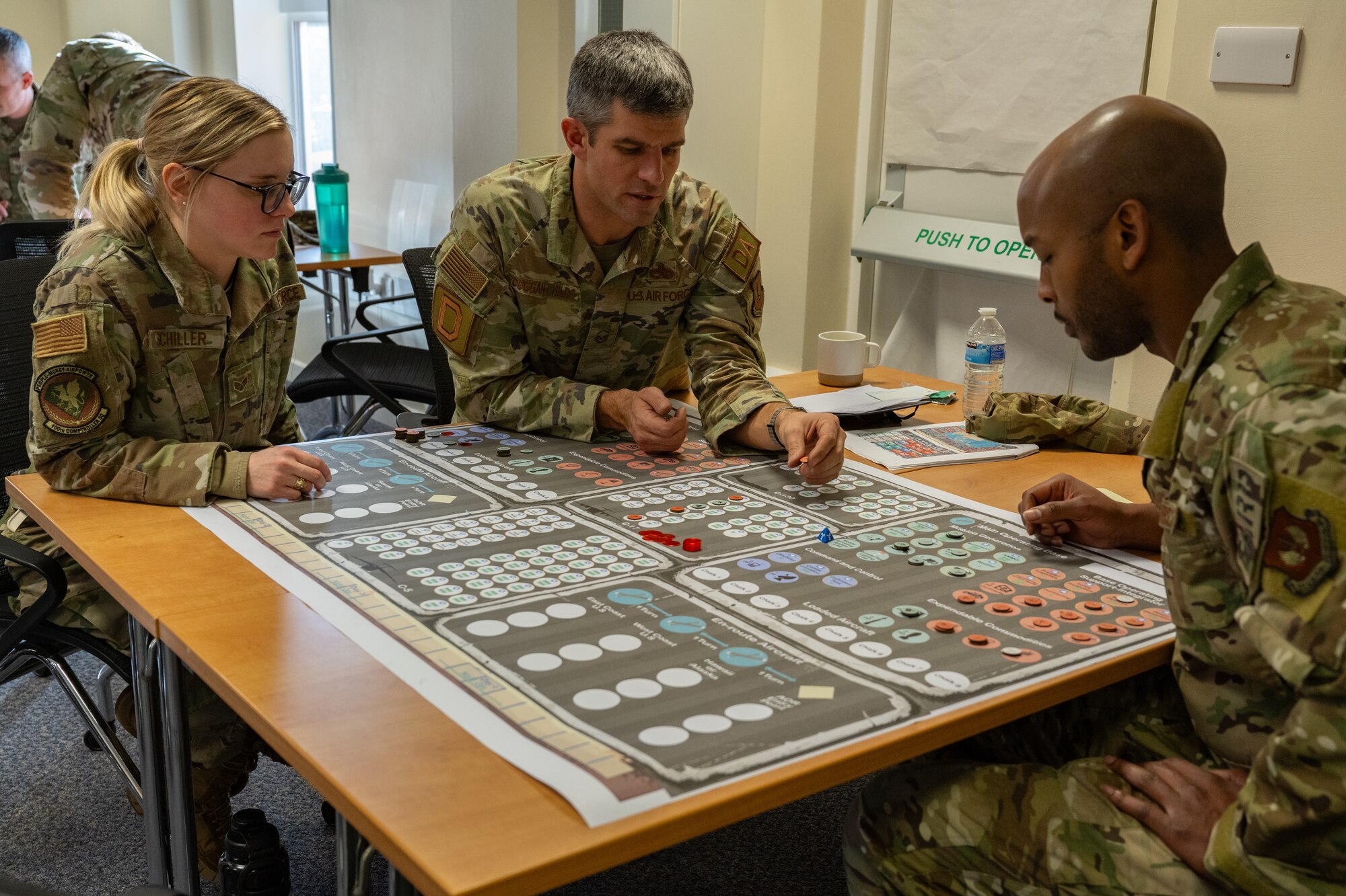 U.S. Airmen assigned to the 100th Air Refueling Wing participate in the Kingfish Agile Combat Employment tabletop at Royal Air Force Mildenhall, England, Jan. 22, 2024.