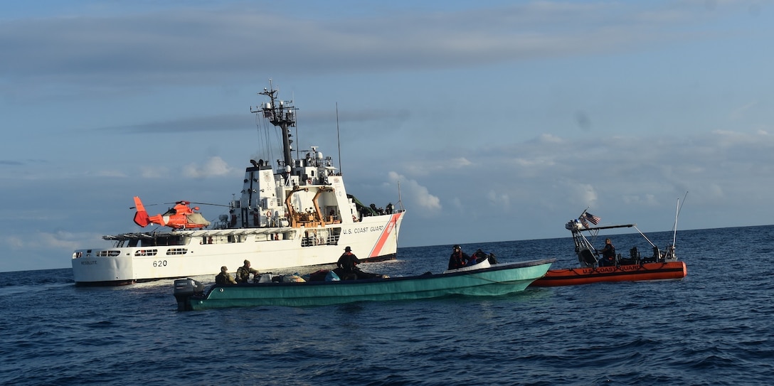 A Coast Guard law enforcement team boards a suspected drug trafficking vessel on the Eastern Pacific Ocean