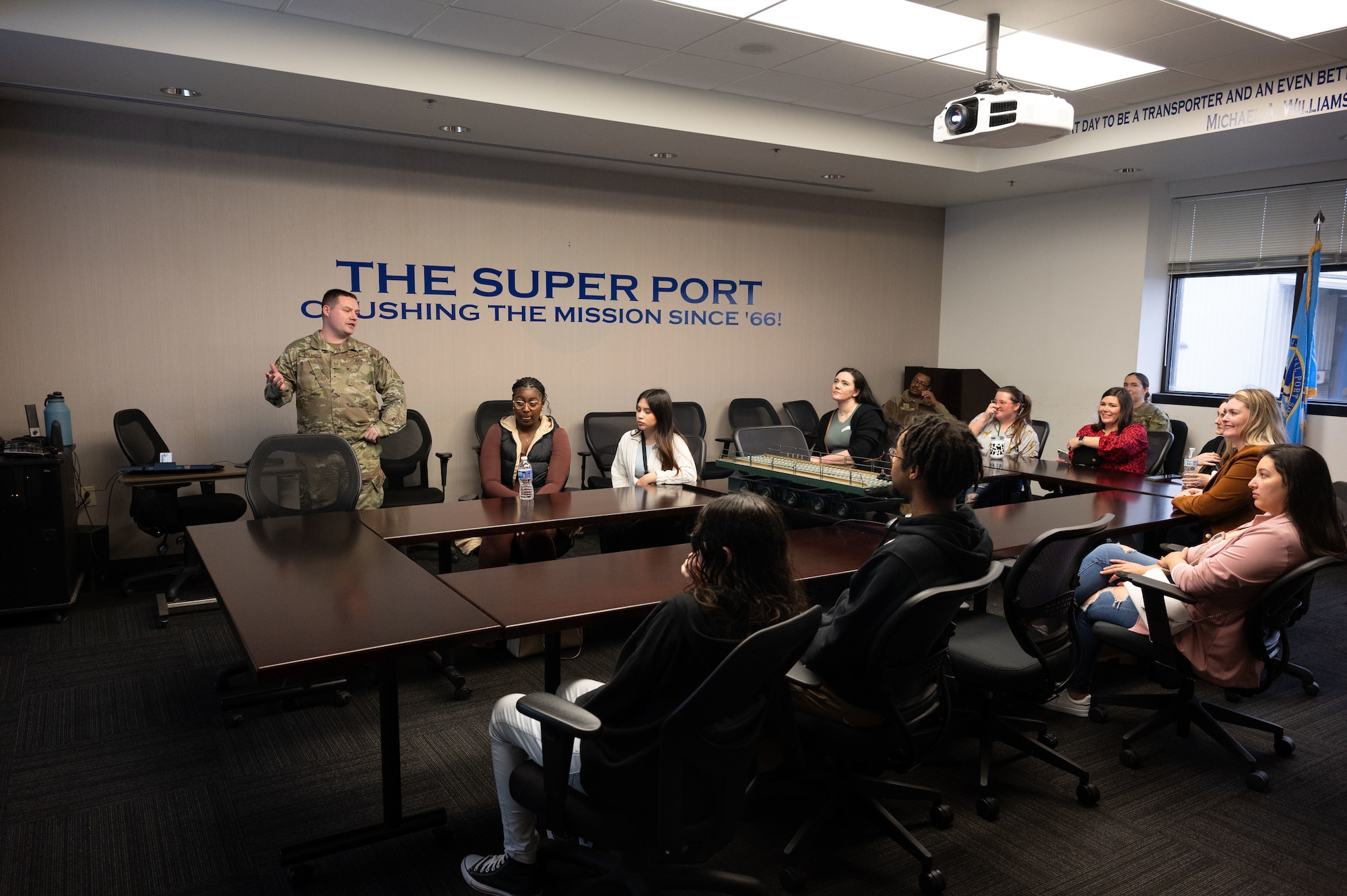 Team Dover spouses are briefed about loading the C-5M Super Galaxy during the 436th Aerial Port Squadron Spouse Immersion tour at Dover Air Force Base, Delaware, Jan. 26, 2024. The tour allowed spouses the opportunity to learn and experience the different jobs within the “Super Port.” (U.S. Air Force photo by Airman 1st Class Dieondiere Jefferies)