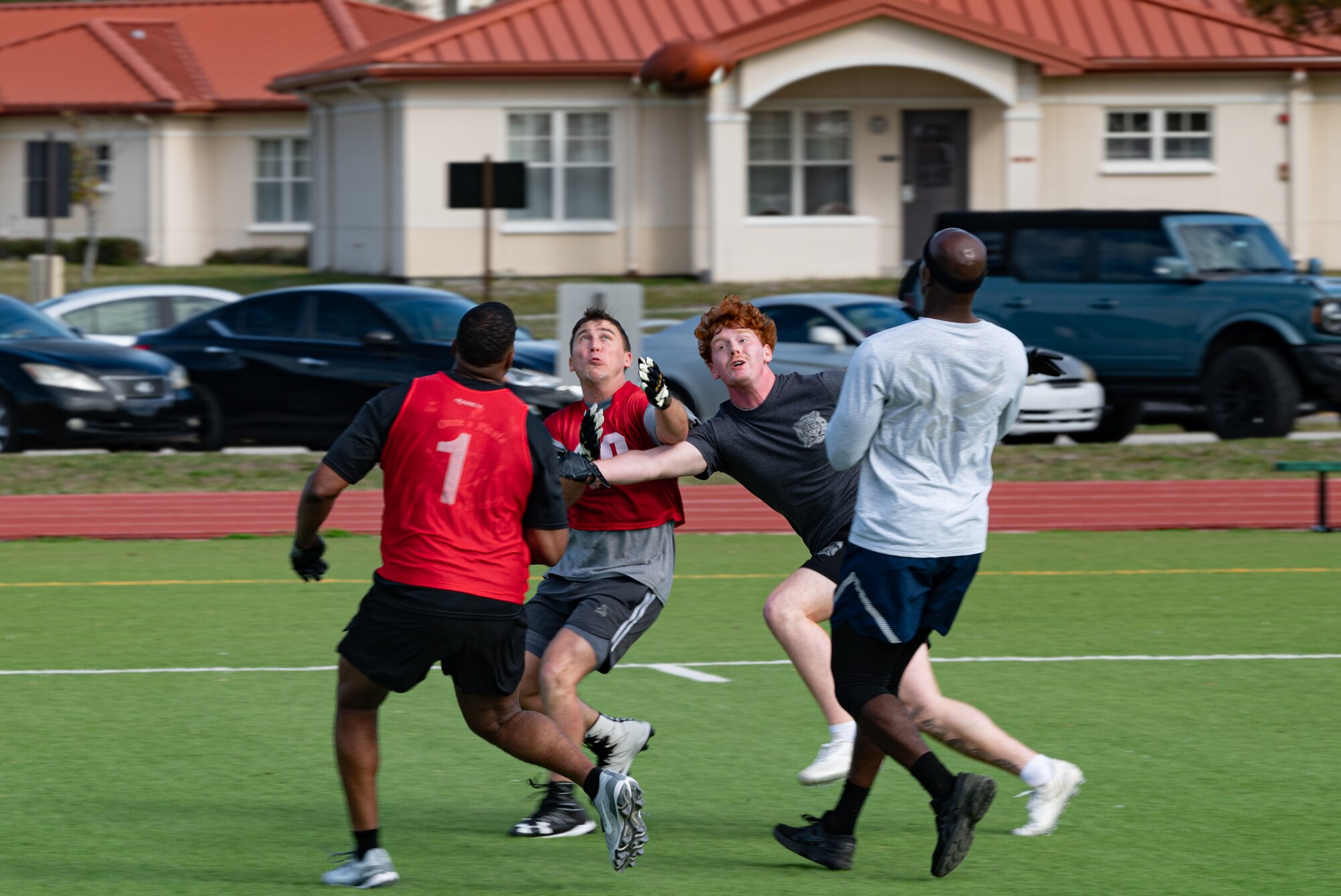 Airmen assigned to the 6th Air Refueling Wing play ultimate football during Wingman Day at MacDill Air Force Base, Florida, Jan. 26, 2024.