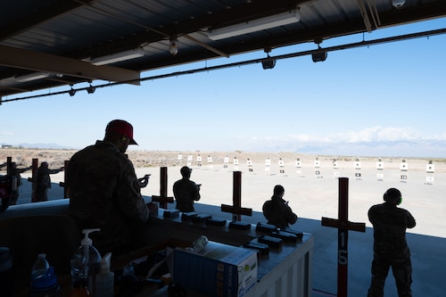U.S. Airmen participate in the Excellence in Competition at Davis-Monthan Air Force Base, Ariz., Jan. 26, 2024. The Airmen shot long-range targets over a series of rounds to receive points in the competition. (U.S. Air Force photo by Airman 1st Class Robert Allen Cooke III)