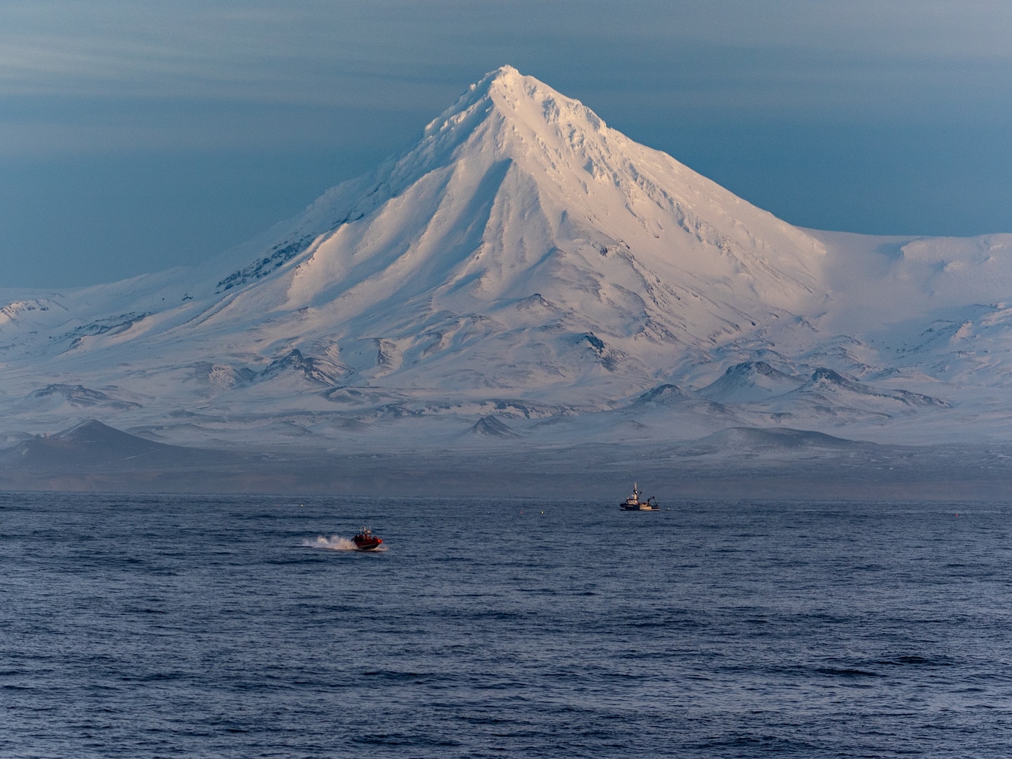 USCGC Alex Haley's (WMEC-39) small boat and boarding team return from a living marine resource protection boarding in the Bering Sea Jan. 15, 2024. Haley's crew completed a 45-day patrol during which they conducted domestic fisheries enforcement, responded to search and rescue, and conducted several shipboard training exercises. (U.S. Coast Guard photo by Petty Officer 1st Class Jasen Newman)