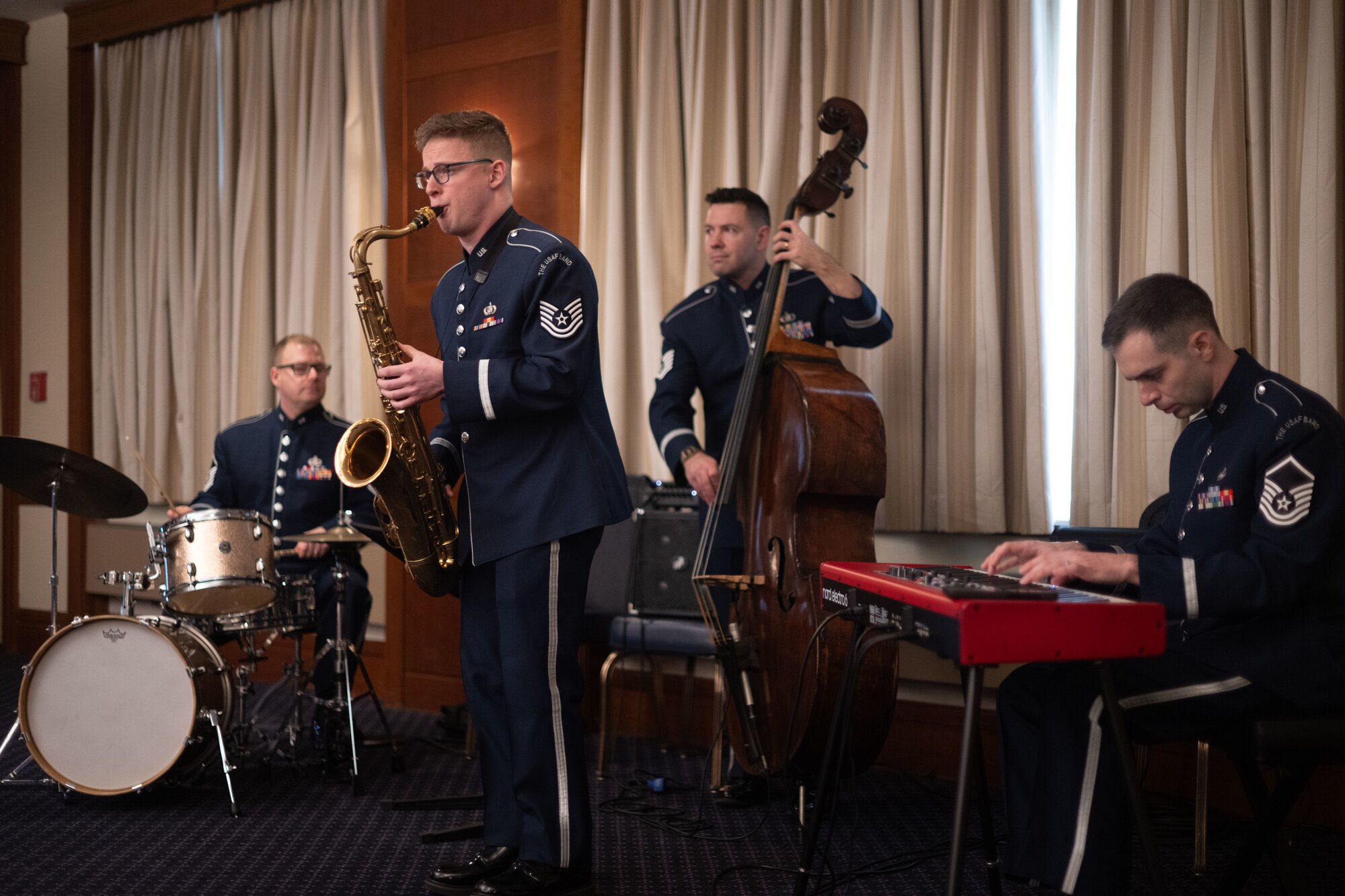 A band plays instruments.