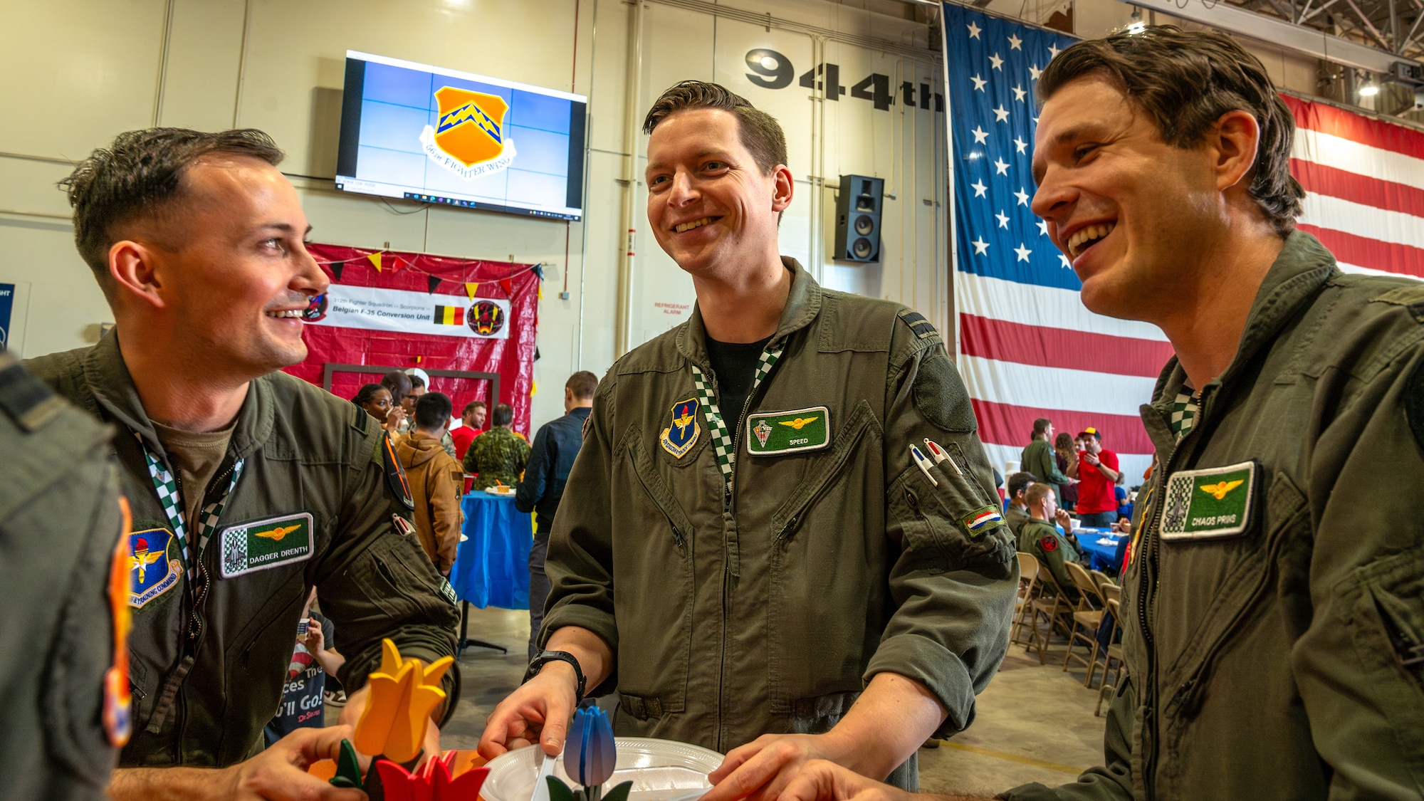 Pilots assigned to the 308th Fighter Squadron converse during the Luke Air Force Base International Festival 2024, Jan 26, 2024, at Luke AFB, Arizona.