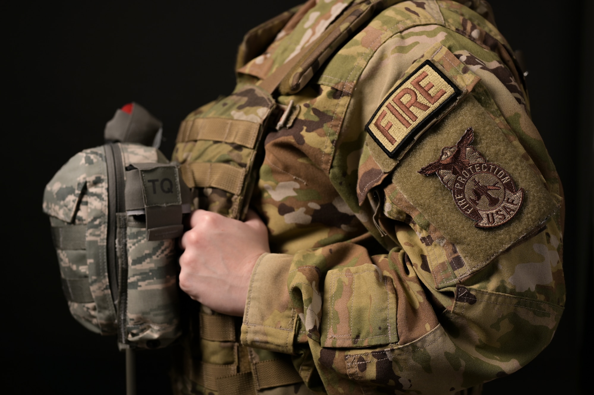 U.S. Air Force Tech. Sgt. Alyssa Poyner, a 1st Special Operations Civil Engineer Squadron lead firefighter, poses for a photo at Hurlburt Field, Florida, Jan. 25, 2024. The “FIRE” patch refers to the fire and emergency services career field. (U.S. Air Force photo by Senior Alysa Airman Calvarese)