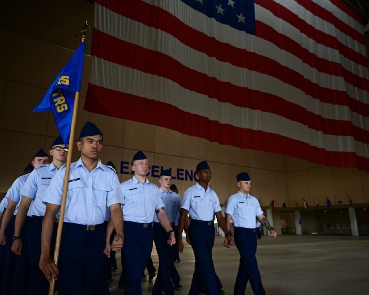 Air Force recruits march in formation.
