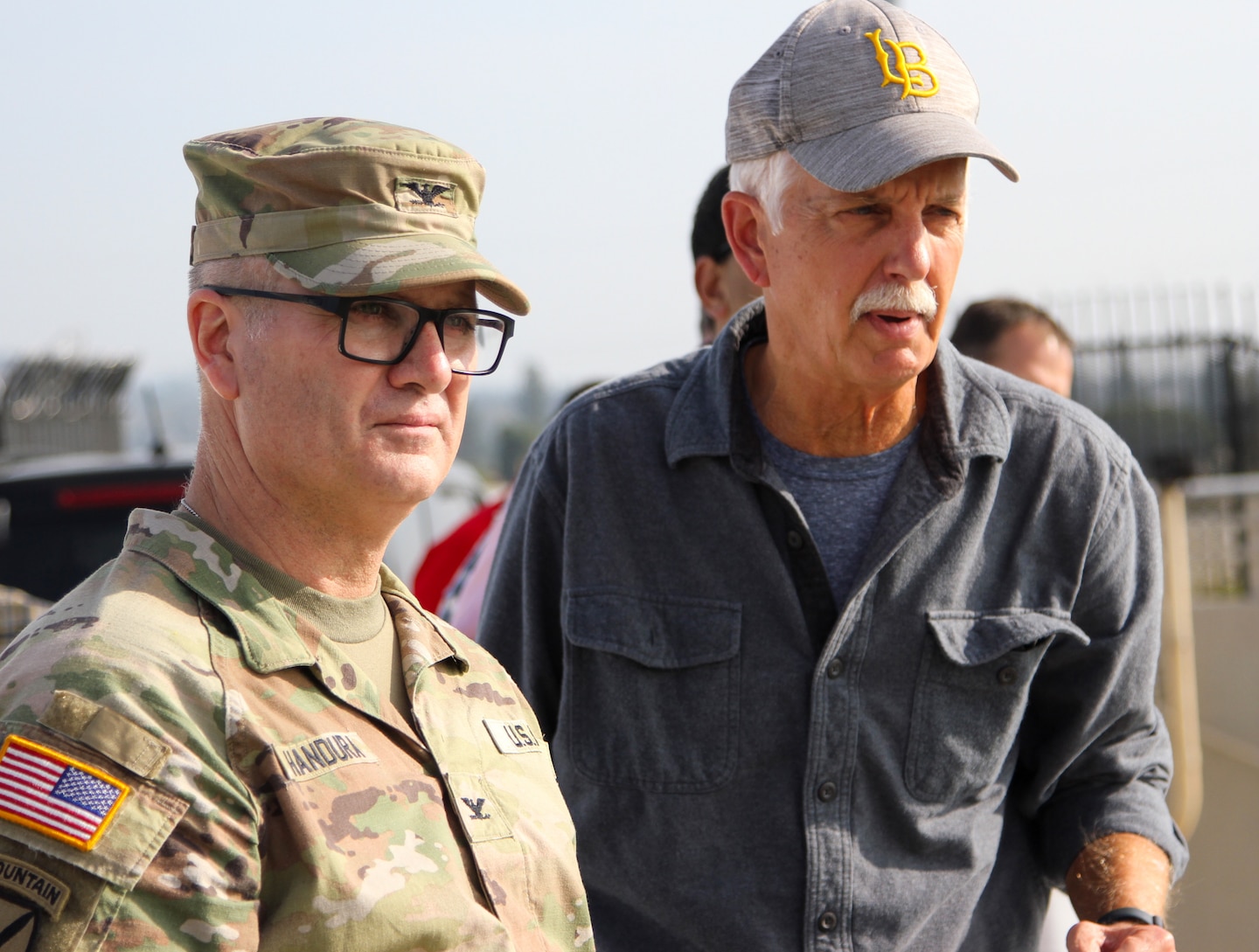 Doug Chitwood, U.S. Army Corps of Engineers Los Angeles District lead project engineer, right, shows features of the Rio Hondo side of Whittier Narrows Dam to Col. James Handura, commander of the Corps’ South Pacific Division, during a site tour Jan. 18 in Montebello, California.