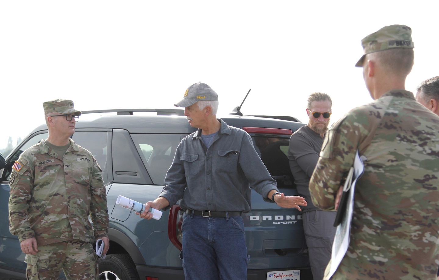 Doug Chitwood, U.S. Army Corps of Engineers Los Angeles District lead project engineer, center, talks with Col. James Handura, commander of the Corps’ South Pacific Division, left, during a site tour Jan. 18 on the Rio Hondo side of Whittier Narrows Dam in Montebello, California.