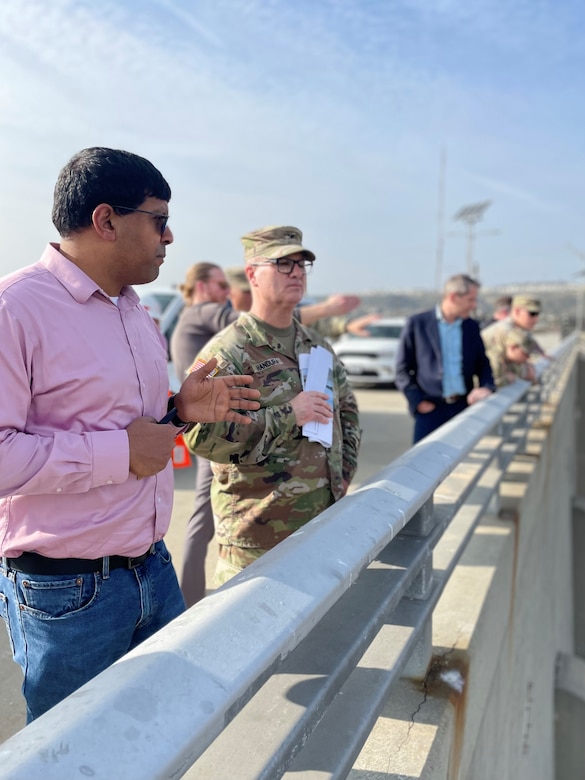 George Sunny, U.S. Army Corps of Engineers Los Angeles District project manager, left, shows features of the Rio Hondo side of Whittier Narrows Dam to Col. James Handura, commander of the Corps’ South Pacific Division, during a site tour Jan. 18 in Montebello, California.