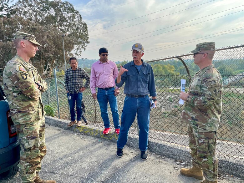 Doug Chitwood, U.S. Army Corps of Engineers Los Angeles District lead project engineer, center, talks with Col. James Handura, commander of the Corps’ South Pacific Division, right, and LA District commander Col. Andrew Baker during a site tour Jan. 18 on the San Gabriel side of Whittier Narrows Dam in Pico Rivera, California.