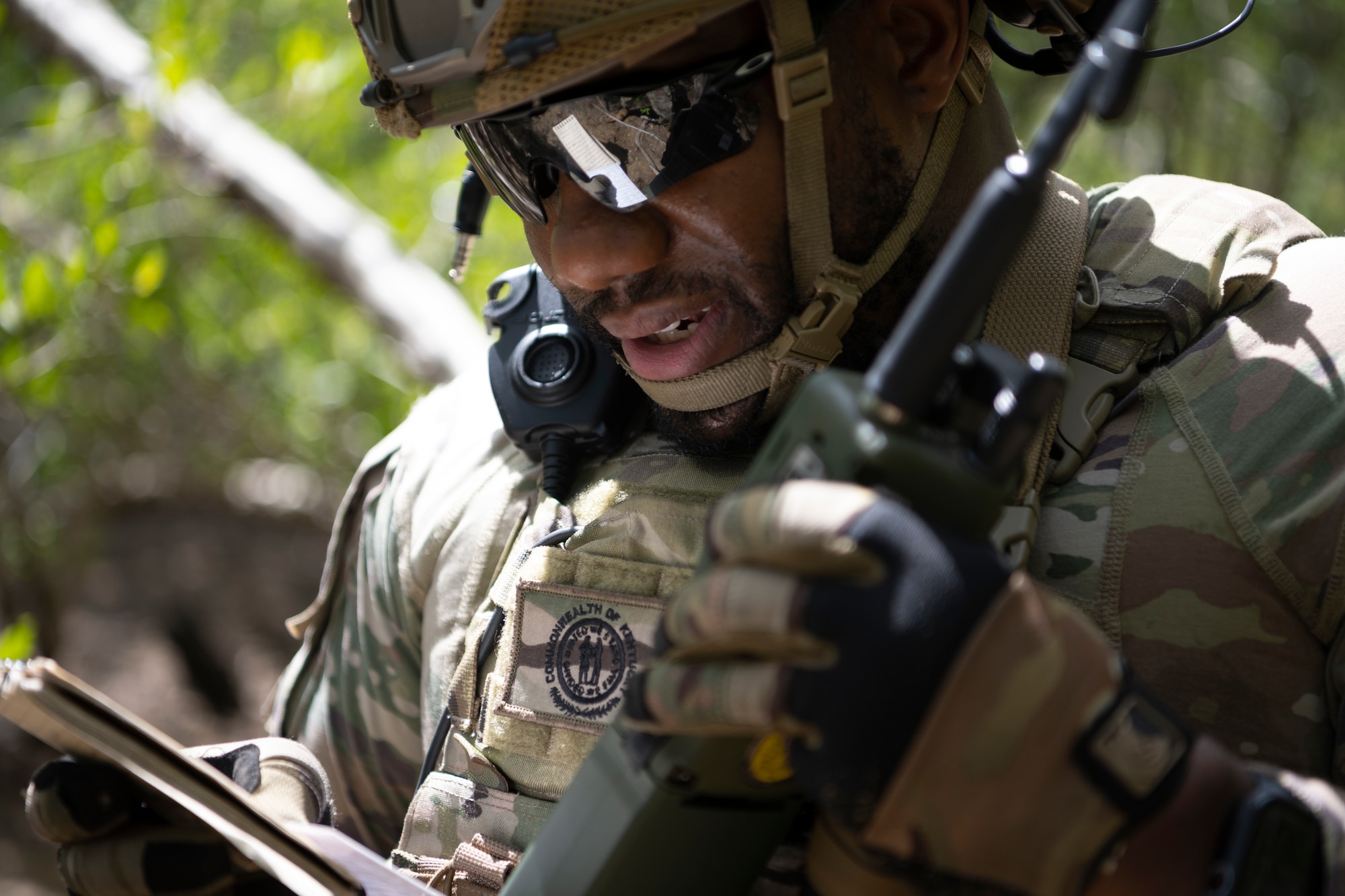 U.S. Air Force Airman 1st Class Tyrone Alexander, a security forces journeyman with the 123rd Contingency Response Group, Kentucky Air National Guard, aims his weapon during air base ground defense training at Muñiz Air National Guard Base, Carolina, Puerto Rico, Sept. 21, 2023. During the training, Airmen reinforced air base ground defense skills utilized during contingency response operations in contested environments by practicing radio communications, warning and operation orders, vehicle searches, vehicle take-downs, close-quarter battle, and small team tactics. (U.S. Air National Guard photo by Master Sgt. Rafael D. Rosa)