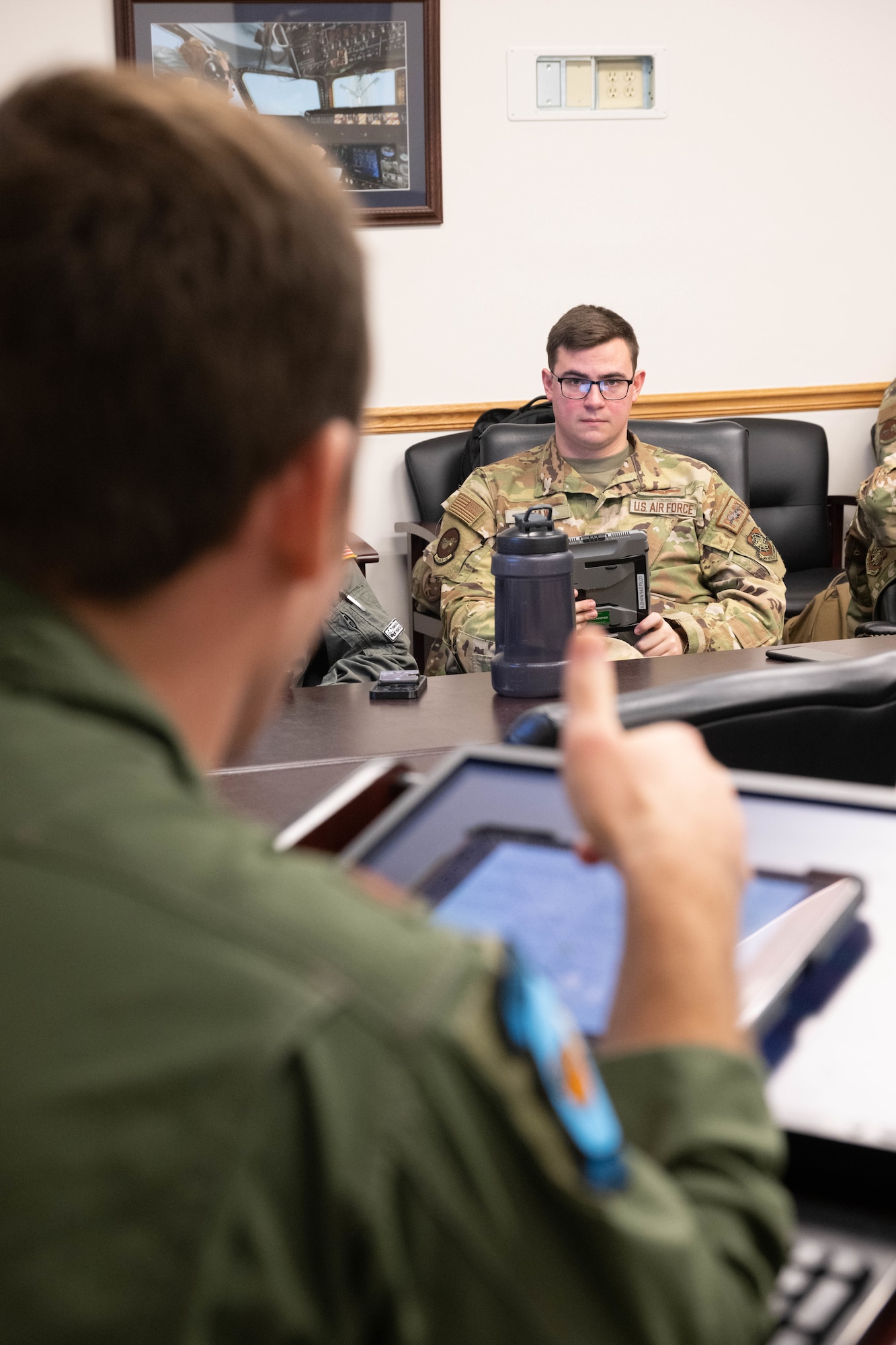 U.S. Air Force Maj. Jeffrey Asper, 9th Airlift Squadron chief of training, briefs a C-5M Super Galaxy aircrew on a Fleet Launch Under Severe Hazards exercise at Dover Air Force Base, Delaware, Jan. 29, 2024. Prior to performing the FLUSH checklist in action, aircrew members received classroom training and simulator practice to familiarize themselves with configuring the aircraft for a rapid departure. (U.S. Air Force photo by Mauricio Campino)