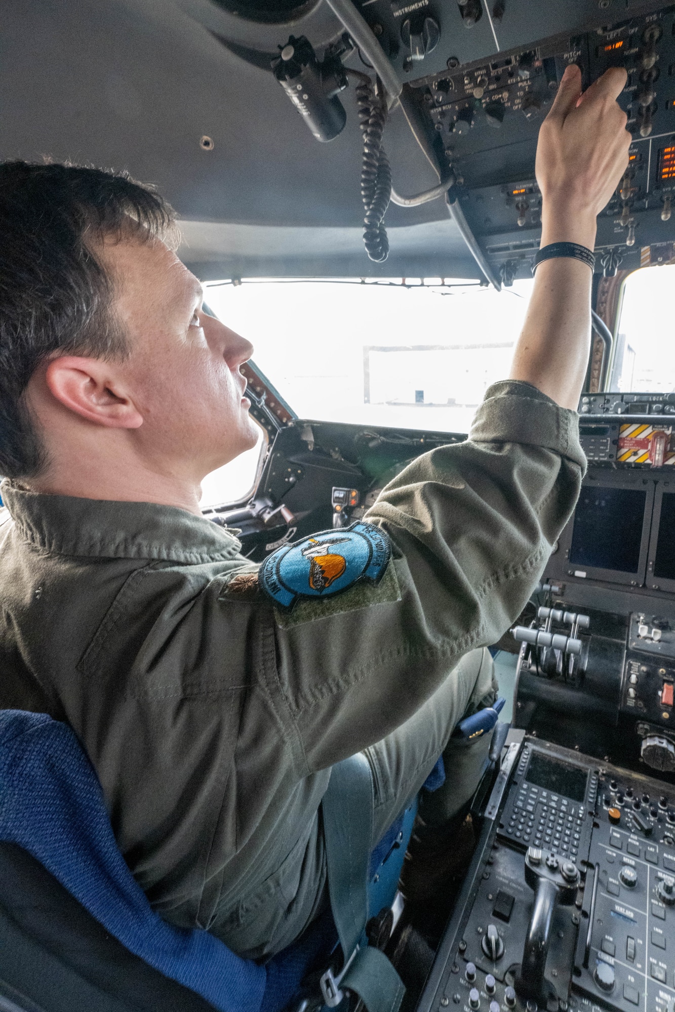 U.S. Air Force Maj. Mike Connelly, 9th Airlift Squadron chief of exercises prepares a C-5M Super Galaxy for take-off during a Fleet Launch Under Severe Hazards exercise at Dover Air Force Base, Delaware, Jan. 29, 2024. The C-5M FLUSH checklist was designed for an aircrew to launch the Super Galaxy from a ‘no power on’ or ‘dark’ status to an all four engines running posture and taxiing off the parking spot in minimal amount of time for departure in case of an imminent threat. (U.S. Air Force photo by Mauricio Campino)