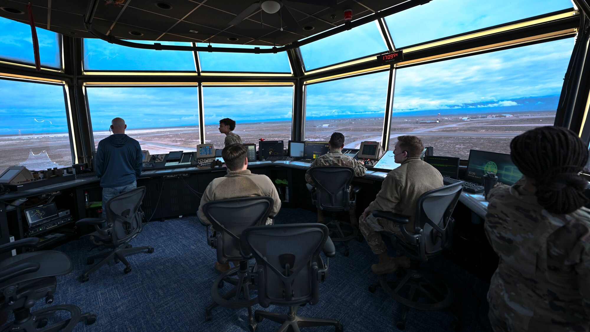 Members from the 54th Operations Support Squadron monitor aircraft movement on the flightline at Holloman Air Force Base, New Mexico, Jan. 24, 2024. ATC’s transmit and listen to multiple frequencies at one time and are responsible for separating and directing aircraft movement during all flightline operations. (U.S. Air Force photo by Airman 1st Class Michelle Ferrari)