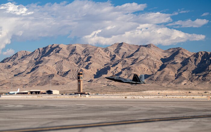 An F-22 Raptor assigned to the 525th Expeditionary Fighter Squadron, Joint Base Elmendorf-Richardson, Alaska, takes off in support of Exercise Bamboo Eagle 24-1 at Nellis Air Force Base, Nevada, Jan. 25, 2024.
