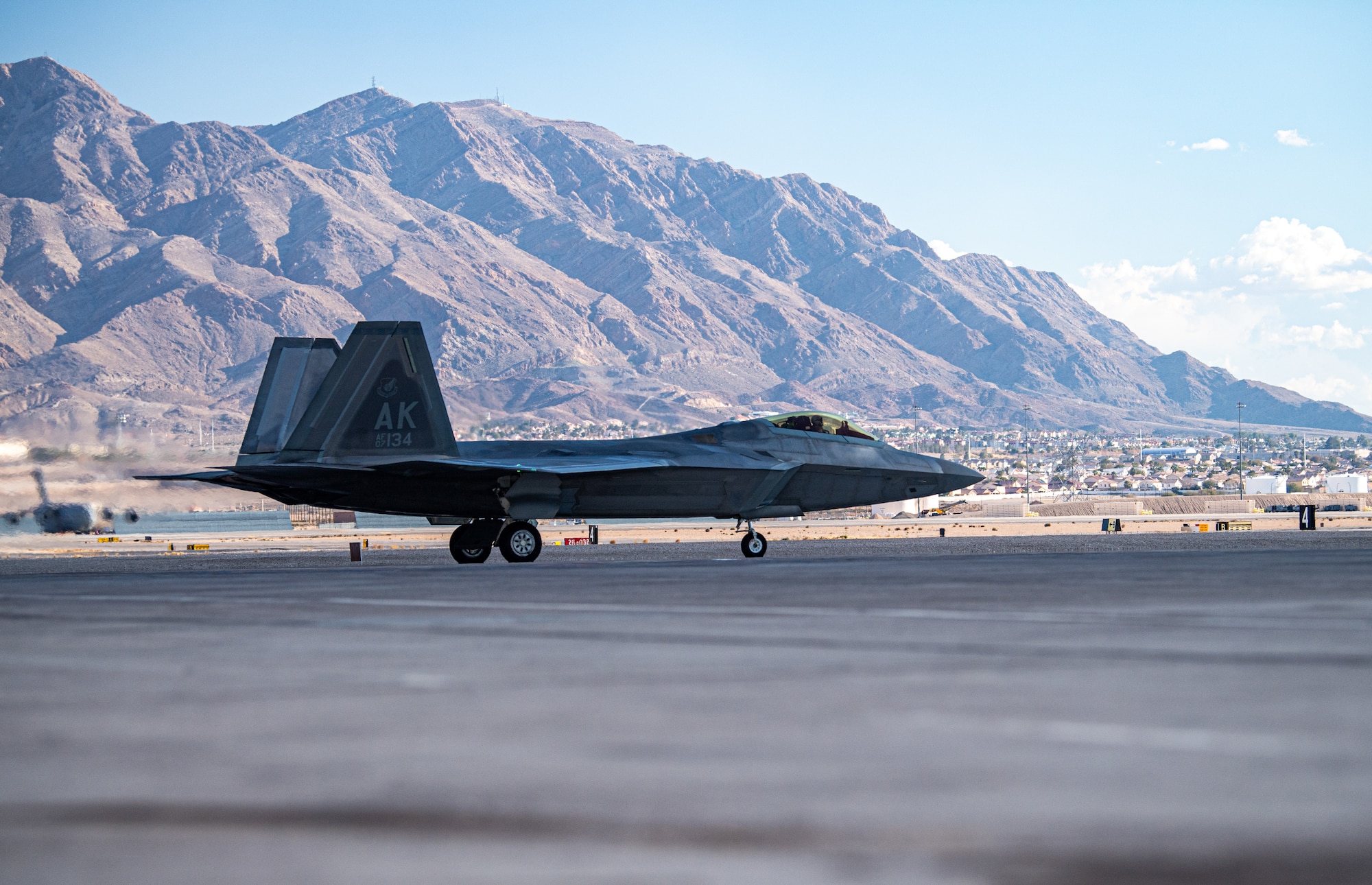 An F-22 Raptor assigned to the 525th Expeditionary Fighter Squadron, Joint Base Elmendorf-Richardson, Alaska, prepares for takeoff in support of Exercise Bamboo Eagle 24-1 at Nellis Air Force Base, Nevada, Jan. 25, 2024.
