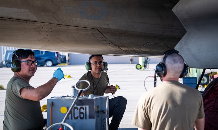 U.S. Air Force Airmen assigned to the 525th Expeditionary Fighter Generation Squadron, Joint Base Elmendorf-Richardson, Alaska, prepare an F-22 Raptor from the 525th Expeditionary Fighter Squadron for takeoff in support of Exercise Bamboo Eagle 24-1 at Nellis Air Force Base, Nevada, Jan. 25, 2024.