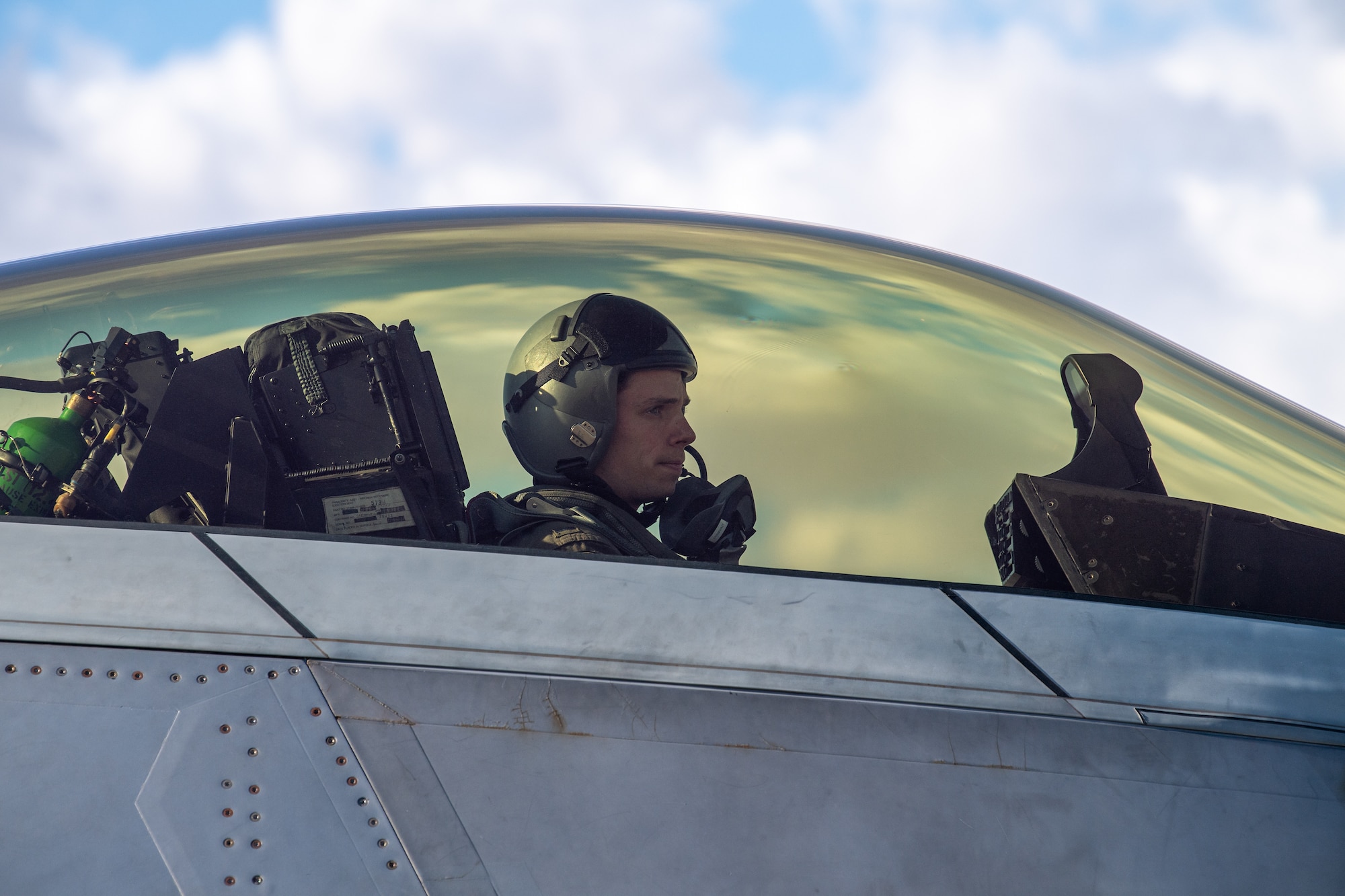 U.S. Air Force 1st Lt. Jake Heydinger, a pilot with the 525th Expeditionary Fighter Squadron, Joint Base Elmendorf-Richardson, Alaska, prepares for flight in support of Exercise Bamboo Eagle 24-1 at Nellis Air Force Base, Nevada, Jan. 25, 2024.