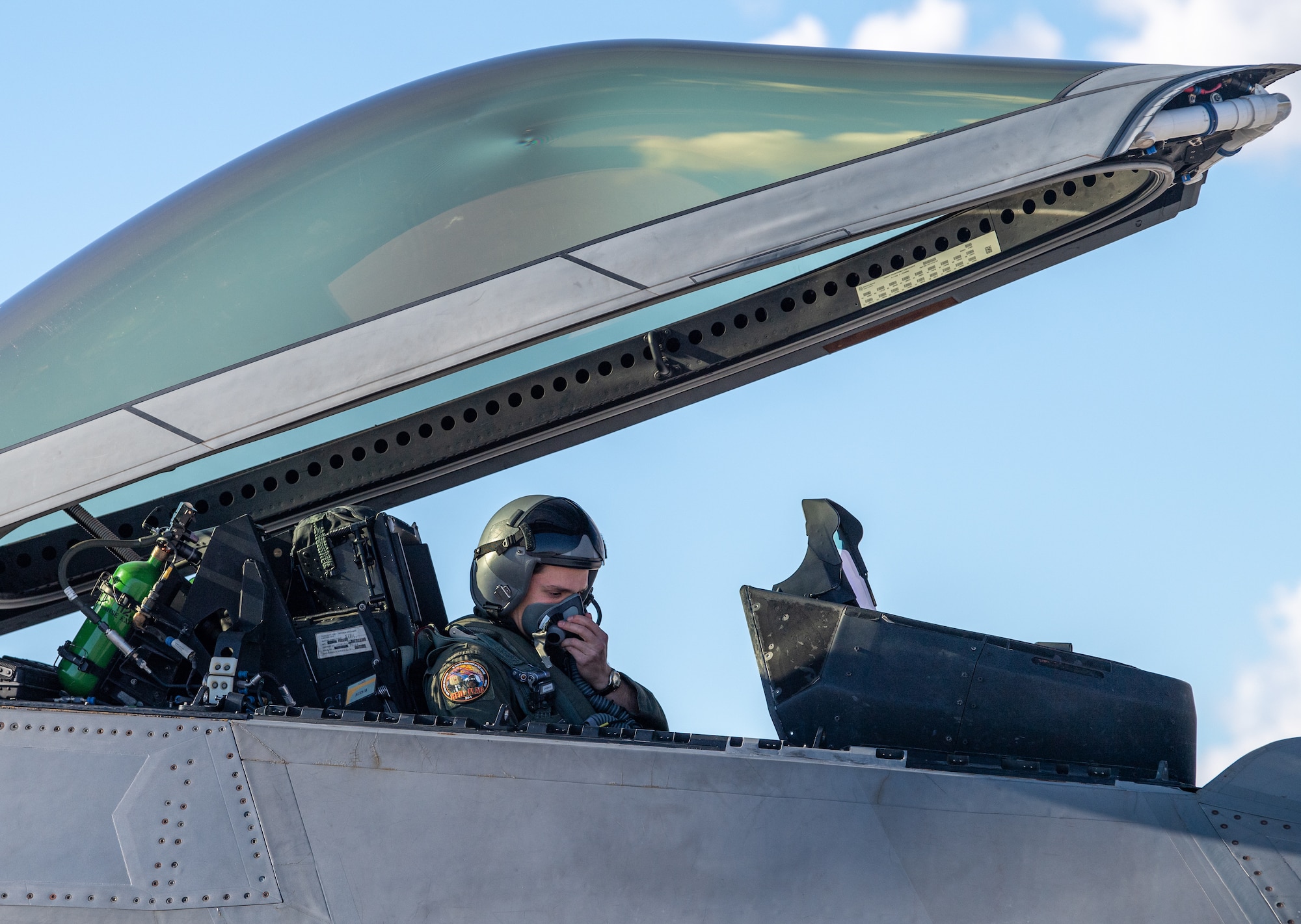 U.S. Air Force 1st Lt. Jake Heydinger, a pilot with the 525th Expeditionary Fighter Squadron, Joint Base Elmendorf-Richardson, Alaska, prepares for flight in support of Exercise Bamboo Eagle 24-1 at Nellis Air Force Base, Nevada, Jan. 25, 2024.