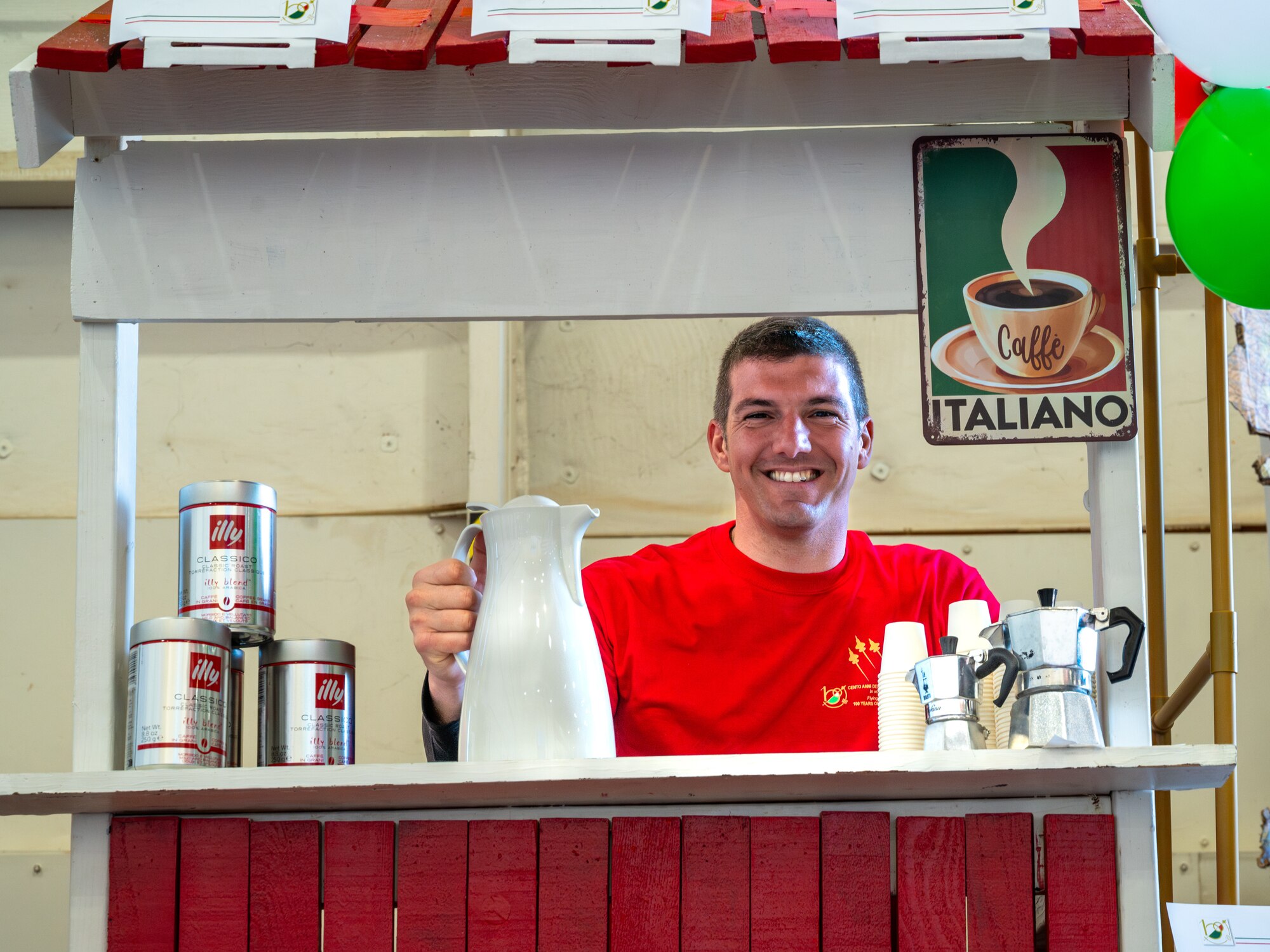 Italian Air Force Maj. Dario Valmori, 62nd Fighter Squadron instructor pilot, prepares to serve traditional Italian coffee at a booth during the Luke Air Force Base International Festival 2024, Jan 26, 2024, at Luke AFB, Arizona.