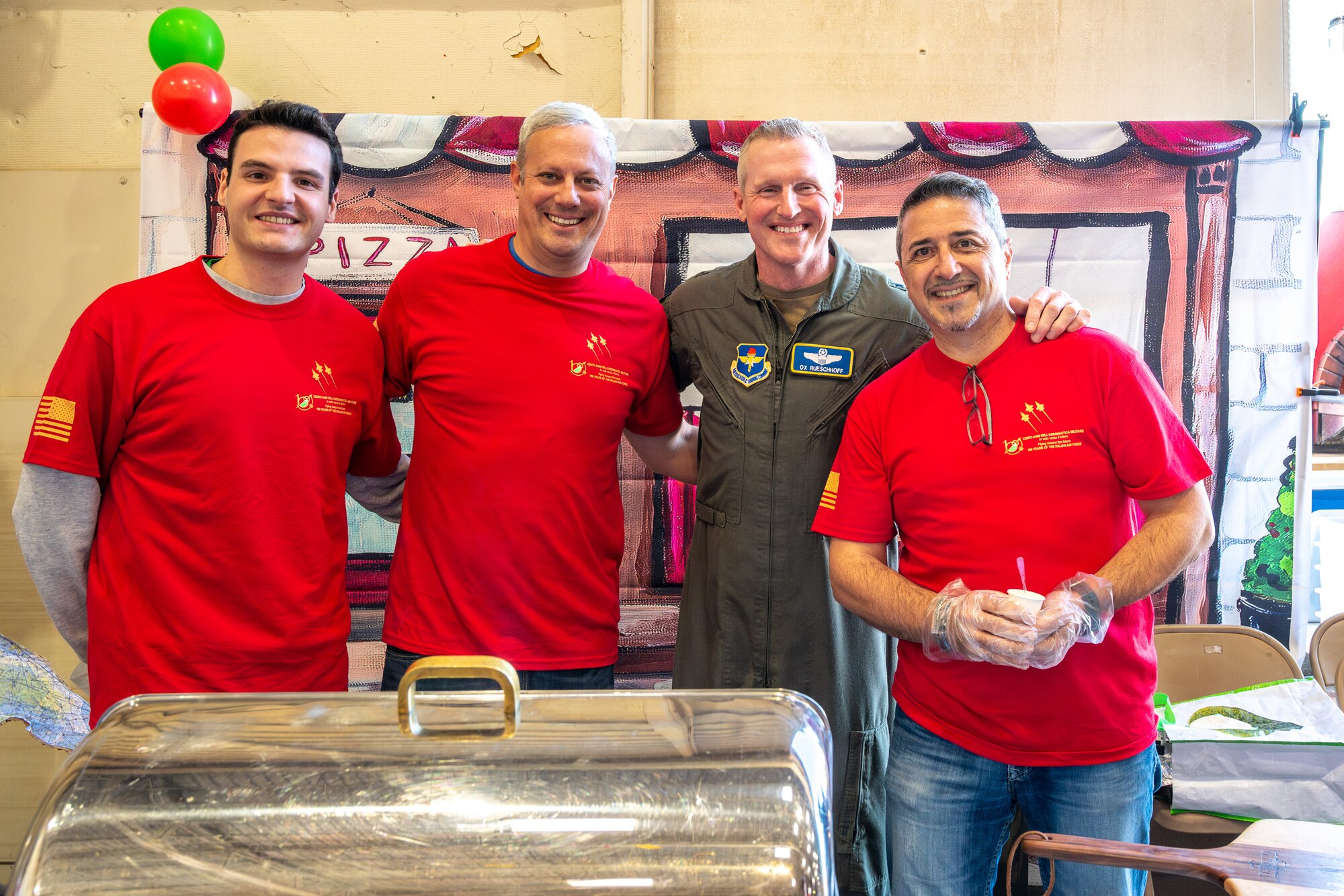 U.S. Air Force Brig. Gen. Jason Rueschhoff (center right), 56th Fighter Wing commander, poses with members of the Italian F-35 Detachment attached to the 62nd Fighter Squadron during the Luke Air Force Base International Festival 2024, Jan 26, 2024, at Luke AFB, Arizona.