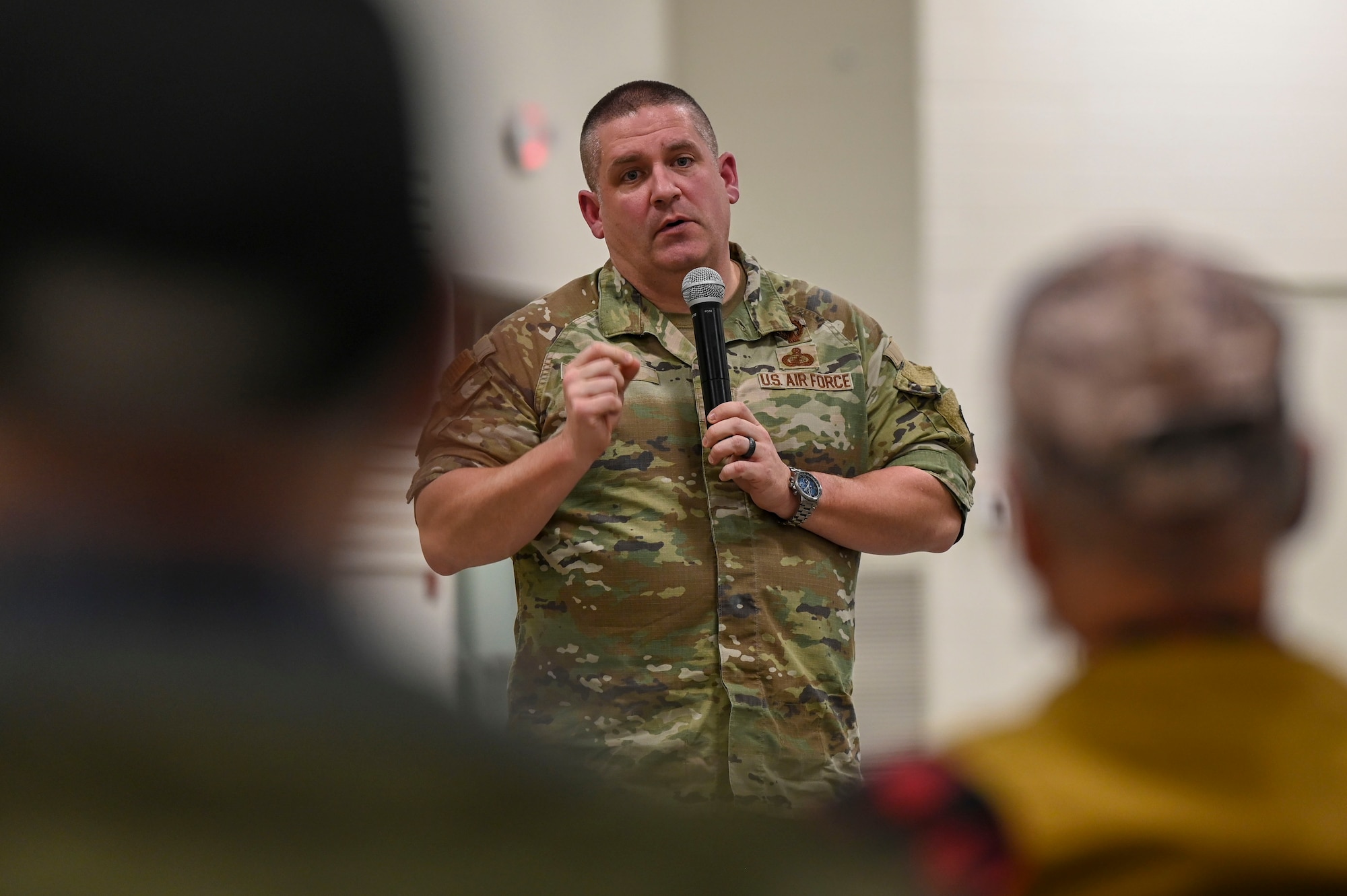 A man speaking to an audience