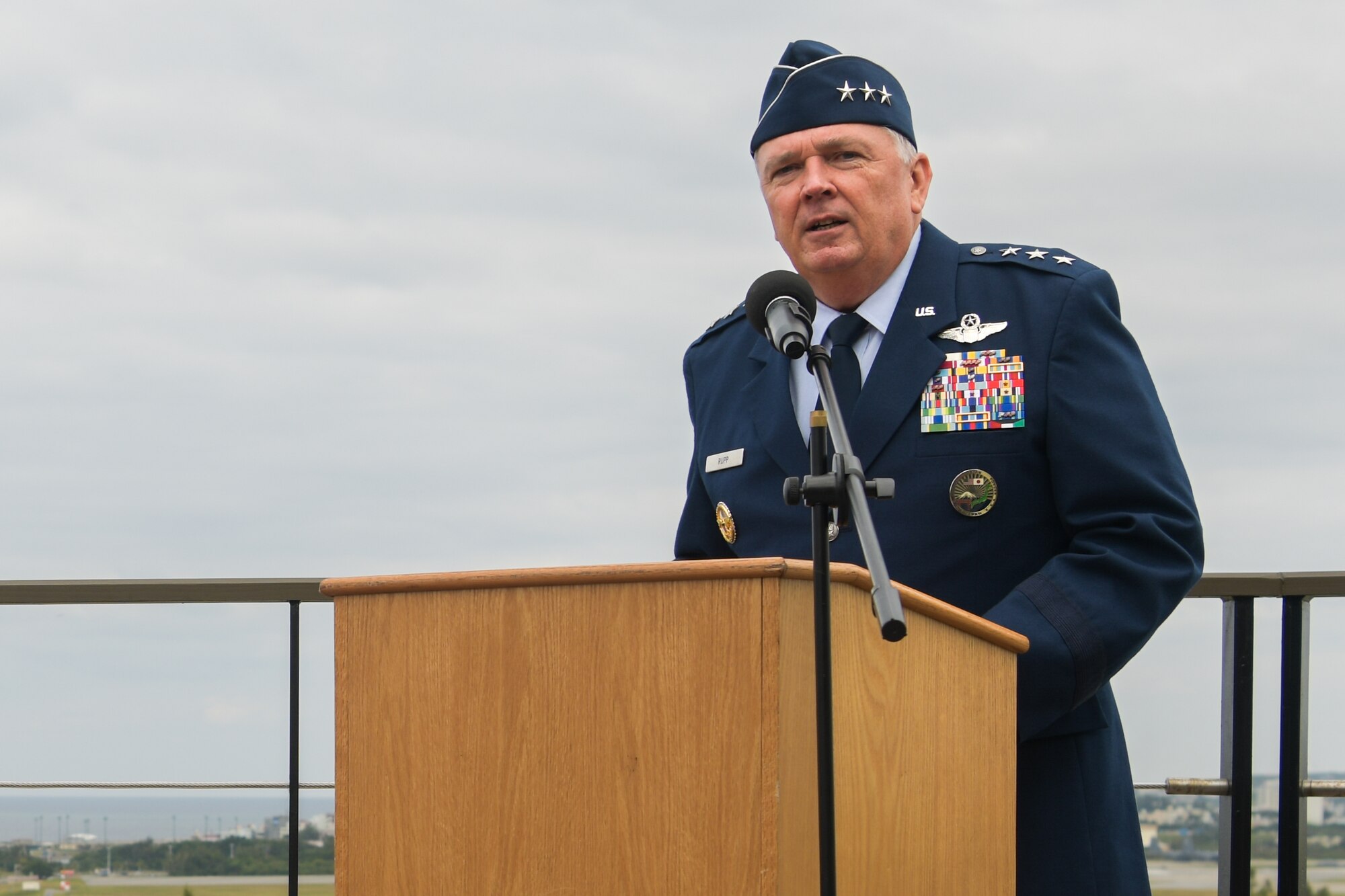 U.S. Air Force Lt. Gen. Ricky Rupp, U.S. Forces Japan and Fifth Air Force commander, speaks during the promotion ceremony for U.S. Air Force Brig. Gen. Nicholas Evans, 18th Wing commander.