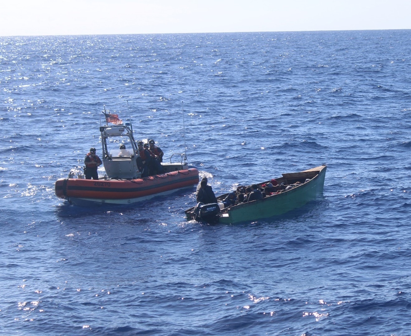Coast Guard Cutter Paul Clark’s cutter small boat interdicts a migrant vessel in Mona Passage waters, approximately 65 nautical miles northwest of Puerto Rico, Jan. 29, 2024.  The Coast Guard Cutter Donald Horsley later embarked and repatriated 28 migrants from this case to a Dominican Republic Navy vessel just off Punta Cana, Dominican Republic, Jan. 30, 2024. (U.S. Coast Guard photo)