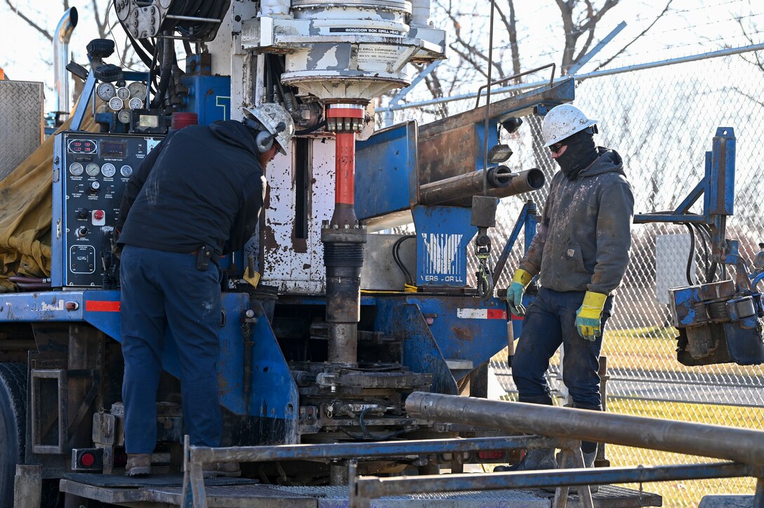 Employees with Traut Companies install drill casing during a remedial investigation into the presence of Per- and Polyfluoroalkyl substances at Truax Field in Madison, Wisconsin, Dec. 12, 2023. The investigation marks the second major step in the Environmental Protection Agency’s Comprehensive Environmental Response, Compensation, and Liability Act process which will guide the mitigation of PFAS compounds on and around the Air National Guard installation. (U.S. Air National Guard photo by Isabella Jansen)