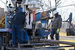 Employees with Traut Companies install drill casing during a remedial investigation into the presence of Per- and Polyfluoroalkyl substances at Truax Field in Madison, Wisconsin, Dec. 12, 2023. The investigation marks the second major step in the Environmental Protection Agency’s Comprehensive Environmental Response, Compensation, and Liability Act process which will guide the mitigation of PFAS compounds on and around the Air National Guard installation. (U.S. Air National Guard photo by Isabella Jansen)