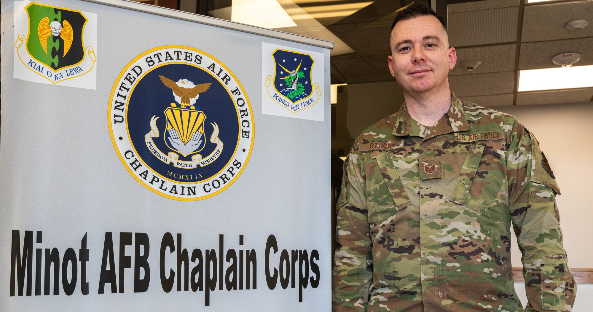 U.S. Air Force Staff Sgt. Daniel Starr, chapel augmentee flight NCOIC, poses for a photo at the North Plains Chapel at Minot Air Force Base, North Dakota, Jan. 25, 2024. Starr was interested in becoming a chaplain and was recently selected to attend Air Force Officer Training School and commission. (U.S. Air Force photo by Airman 1st Class Kyle Wilson)