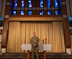 U.S. Air Force Staff Sgt. Daniel Starr, chapel augmentee flight NCOIC, poses for a photo at the North Plains Chapel at Minot Air Force Base, North Dakota, Jan. 25, 2024. Starr was recently selected to attend Air Force Officer Training School to commission as a chaplain. (U.S. Air Force photo by Airman 1st Class Kyle Wilson)