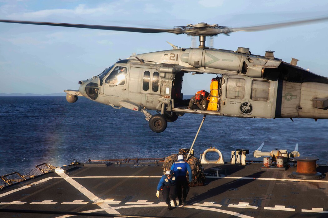 USS Arleigh Burke (DDG 51) helicopter in-flight refueling with HSC-26.
