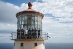 Ron Cianfarani, retired U.S. Coast Guard Senior Chief Petty Officer and the final manual caretaker of the Makapu’u Lighthouse, received a guided tour from the Coast Guard’s Aids to Navigation Team (ANT) Honolulu, Jan. 24, 2024. Built in 1909, the Makapu’u lighthouse was a fully manned and operational station until becoming automated in 1974. The Lighthouse has been under the maintenance and care of ANT Honolulu for the past 50 years.