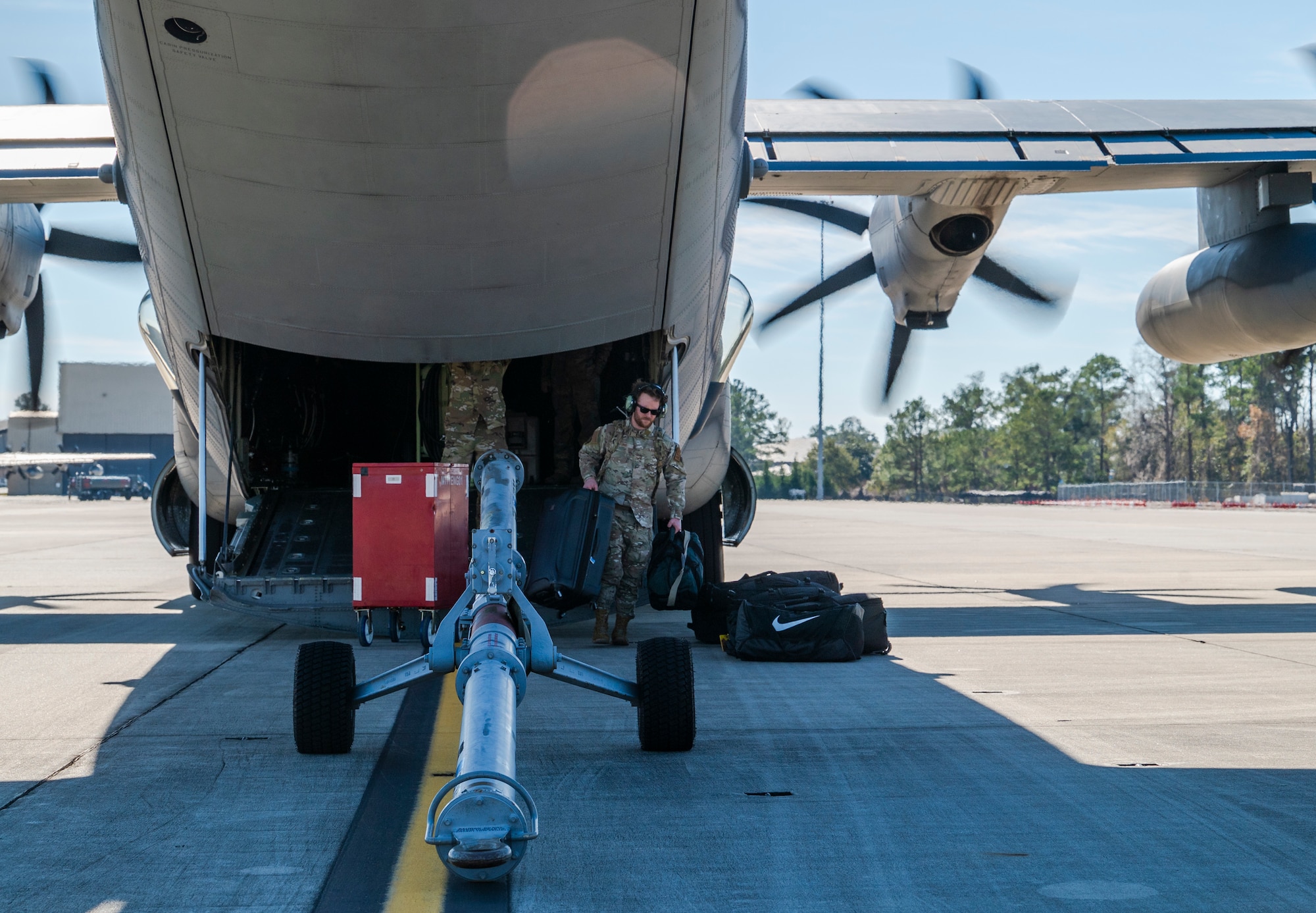 An HC-130J Combat King II sits on the runway at Moody Air Force Base, Georgia, Jan. 10, 2024, preparing to depart for exercise Red Flag 24-1. Red Flag exercises provide aircrews the experience of multiple, intensive air combat sorties in the safety of a training environment. (U.S. Air Force photo by Airman 1st Class Leonid Soubbotine)