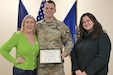 Sgt. 1st Class Paul Almquist, a range operations noncommissioned officer with the Fort Indiantown Gap Training Center, receives an award for his volunteer work with Big Brothers Big Sisters of the Capital Region during a ceremony at Fort Indiantown Gap, Pennsylvania, Jan. 30, 2024. Almquist has volunteered with that organization for eight years, impacting children’s lives. Deborah Wright, director of Lebanon and Lancaster counties presented the award on behalf of Big Brothers Big Sisters. (U.S. Army National Guard photo by 2nd Lt. Kate Kramer)