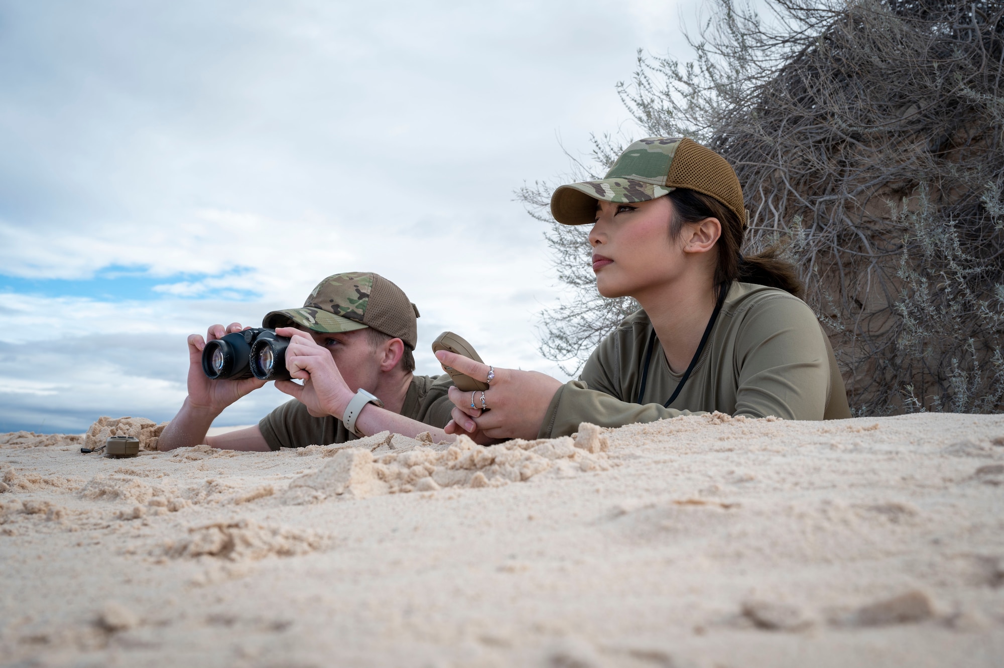 U.S. Air Force Airmen 1st Class Adam Sapp and Kiandra Mandal, 54th Operations Support Squadron weather flight apprentices, monitor the training area for weather changes during an exercise at Holloman Air Force Base, New Mexico, Jan. 22, 2024. The 54th OSS is responsible for the forecast management for the entirety of the base and ensuring Holloman’s flying mission continues safely. (U.S Air Force photo by Airman 1st Class Isaiah Pedrazzini)