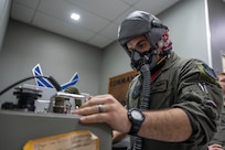 U.S. Air Force 1st Lt. Hayden Gebo, 345th Expeditionary Bomb Squadron B-1B Lancer pilot, out of Dyess Air Force Base, Texas, performs a preflight check at Paya Lebar Air Base, Singapore, Jan. 19, 2024. The U.S. Air Force’s partnership with the Republic of Singapore Air Force provides valuable professional exchanges and training opportunities with different aircraft and aircrews. (U.S. Air Force Photo by Senior Airman Ryan Hayman)
