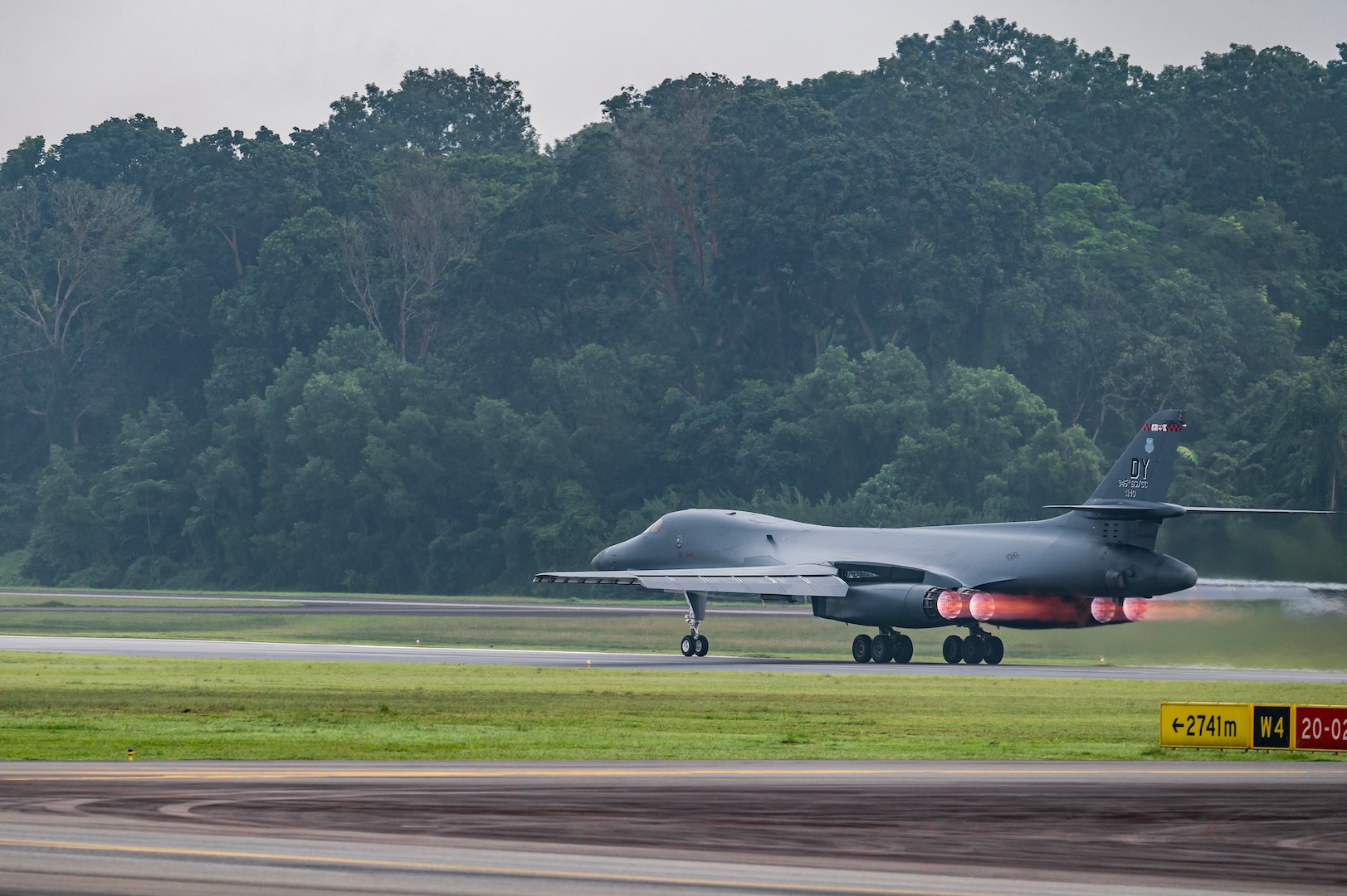 A B-1B Lancer assigned to the 345th Expeditionary Bomb Squadron, out of Dyess Air Force Base, Texas, takes off at Paya Lebar Air Base, Singapore, Jan. 24, 2024. The 345th EBS arrived in Singapore as part of regular U.S. Air Force training and engagements with key partners in the region. (U.S. Air Force photo by Senior Airman Ryan Hayman)